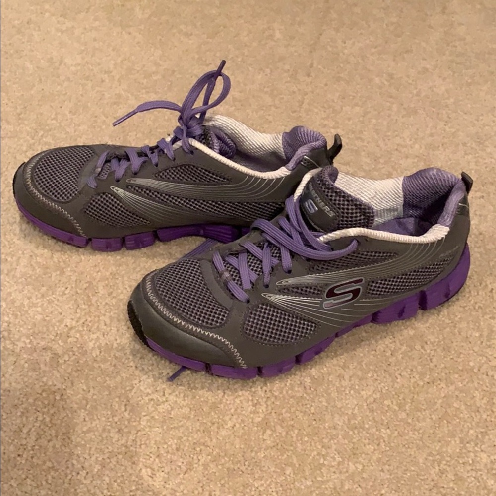 Sketchers sport grey and purple shoes. Size: 7